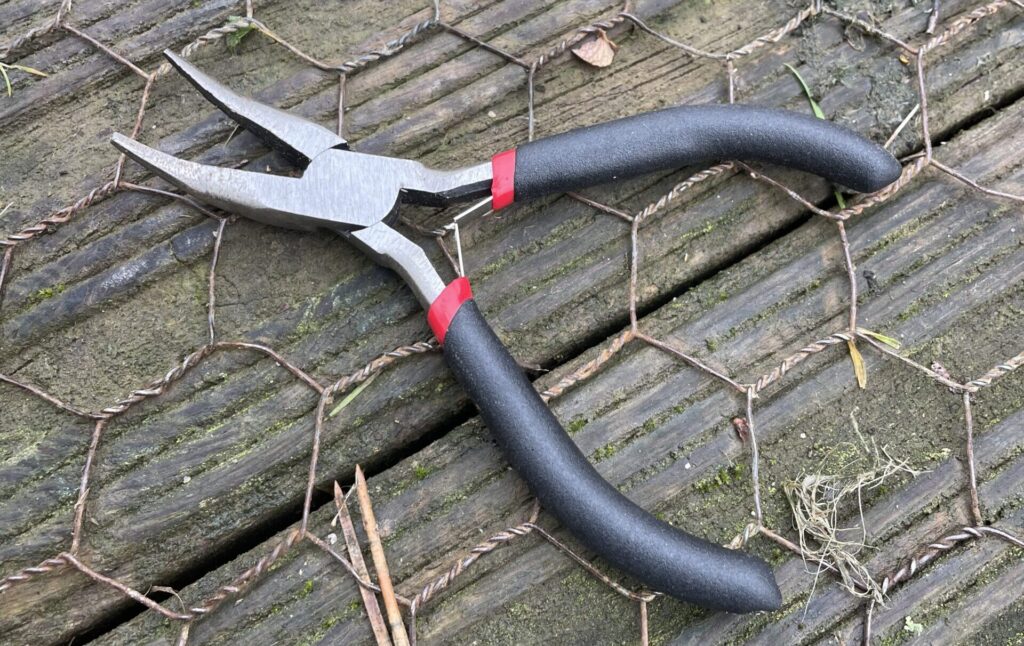 A pair of pliers for fishing