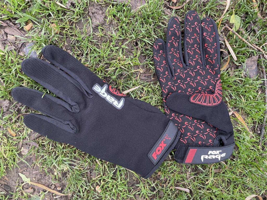 A pair of unhooking gloves for fishing.